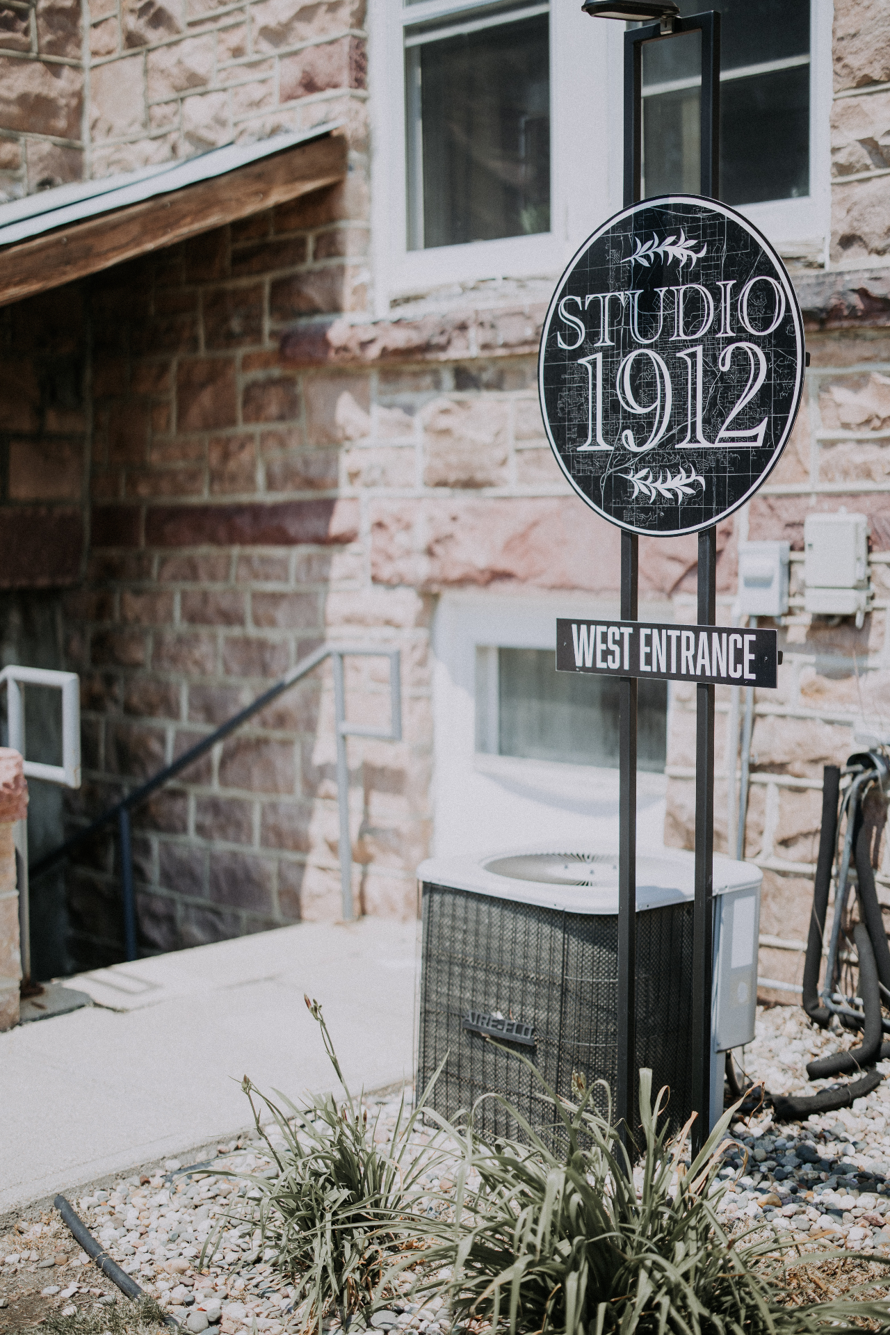 West Entrance signage at Studio 1912