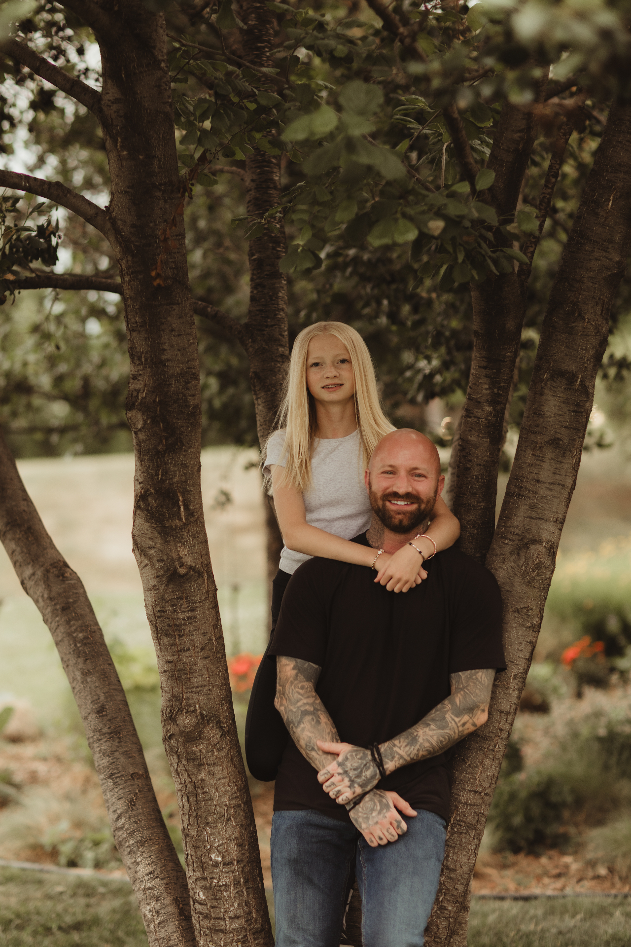 Michael and his daughter in the trees
